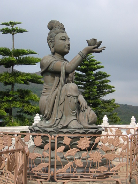 statue with lotus flower