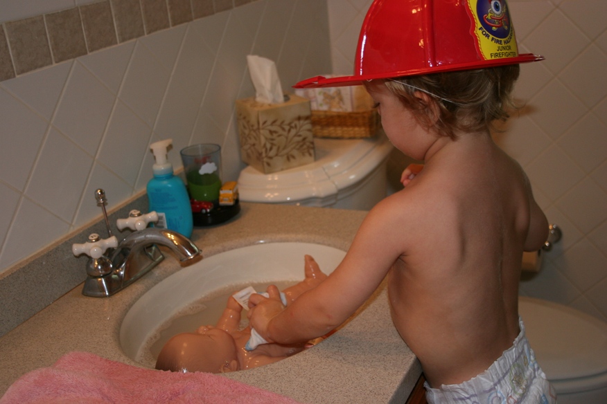 washing his own baby